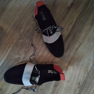 Brash stylish sneaker worn one time in new like condition